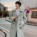 Korean Style Men's Windbreakers Lapel Belt Design Double Breasted Solid Color Ovreknee Male Trench Spring